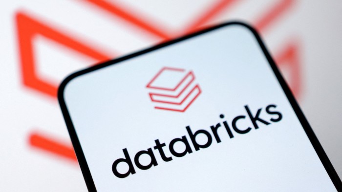 The Databricks logo is seen on a smartphone